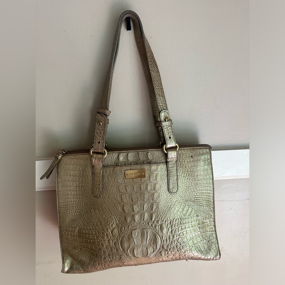 Brahmin shoulder bag featuring a metallic gold crocodile-embossed leather finish